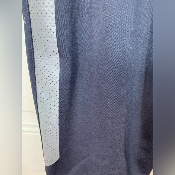 Reebok Dark Gray Stretchy Soft Track Pants. 3 pockets.  Zippers at leg base. - Picture 10 of 13